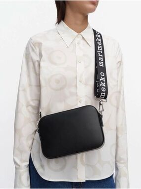 Marimekko Gratha Logo Strap
Shoulder bag - black leather